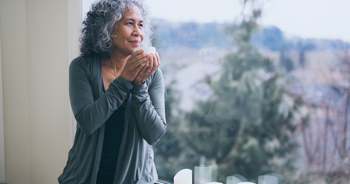 Woman at Window with Cup